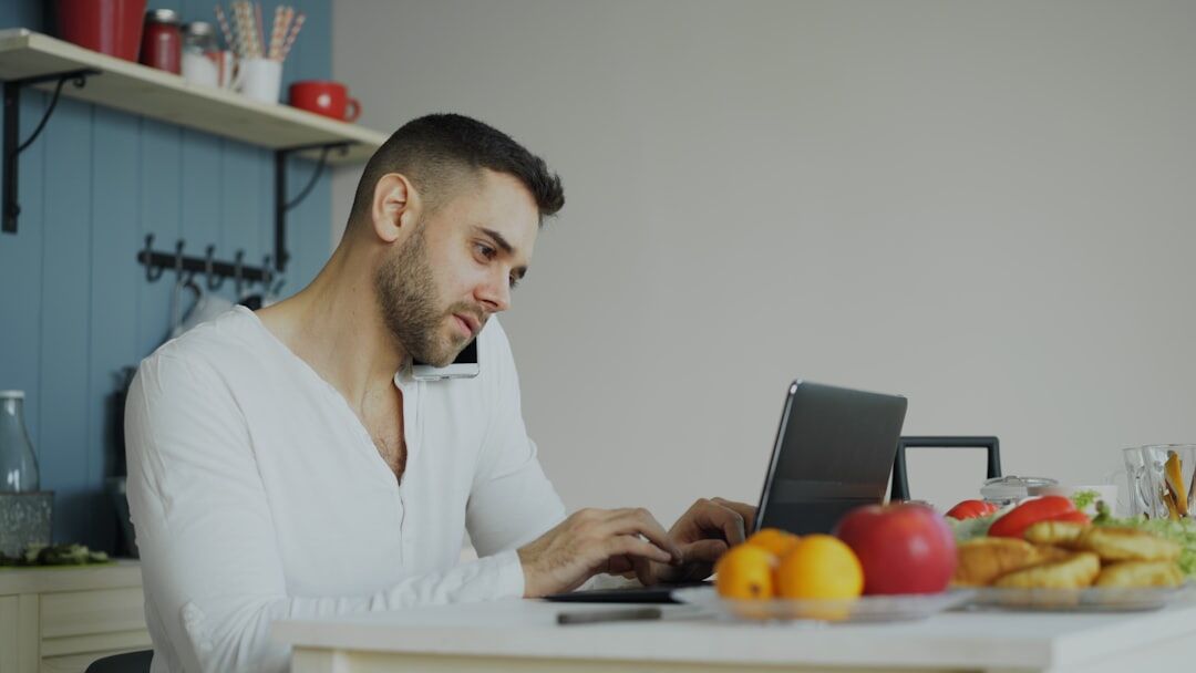 person typing on keyboard